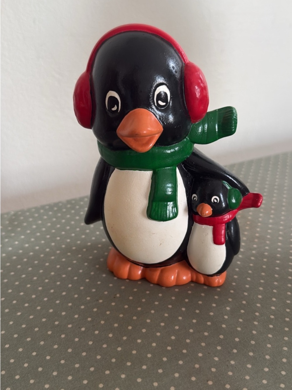 Black Penguin Pair Figurine with Green Scarf and Red Earmuffs